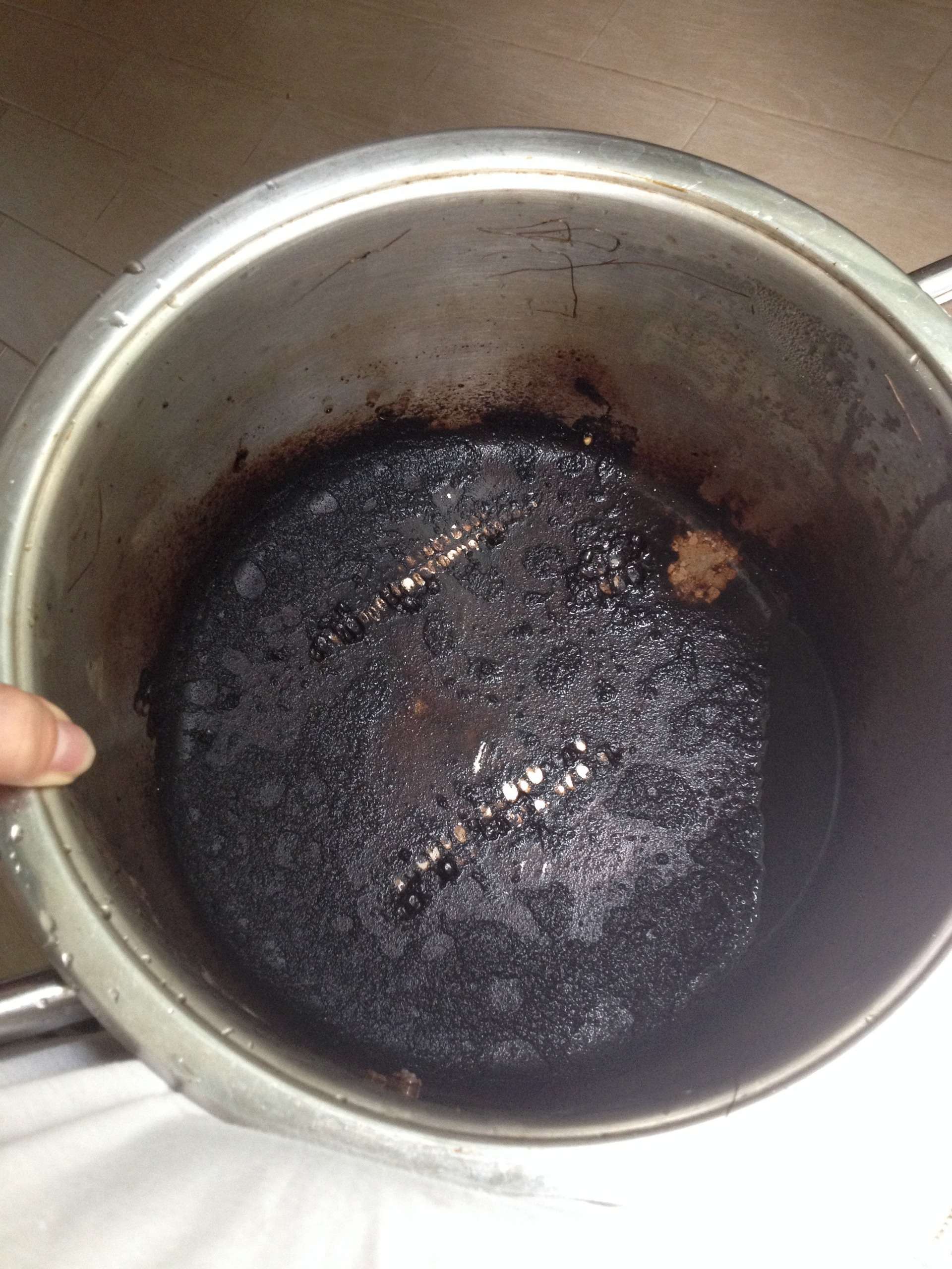 soot from jam in a saucepan