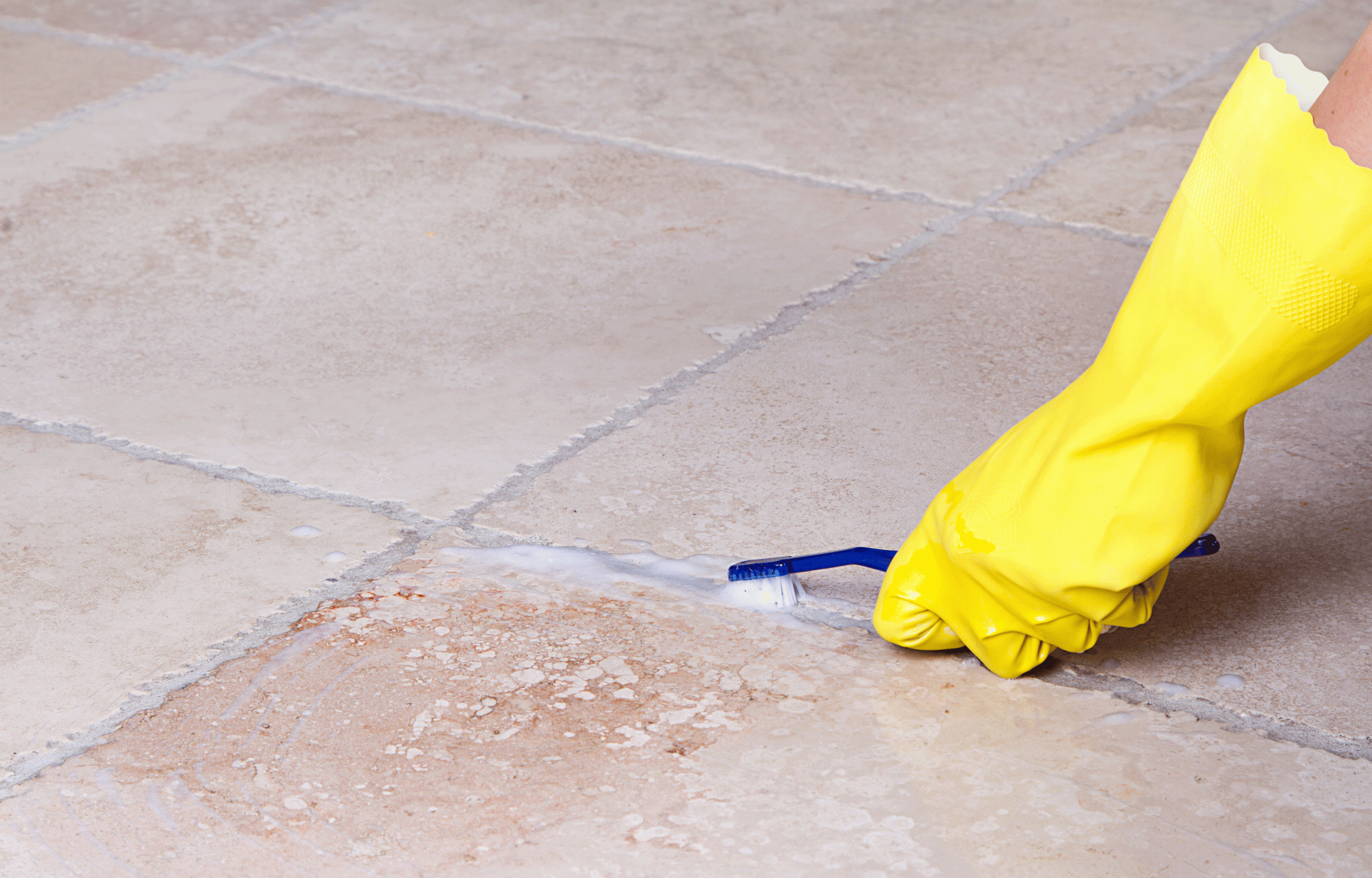 cleaning the floor with gloves