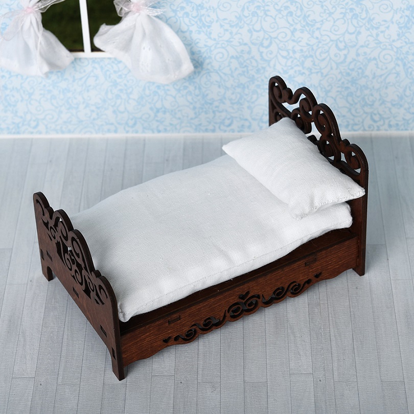 doll bed with pillow