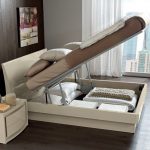 bed with lifting mechanism photo views