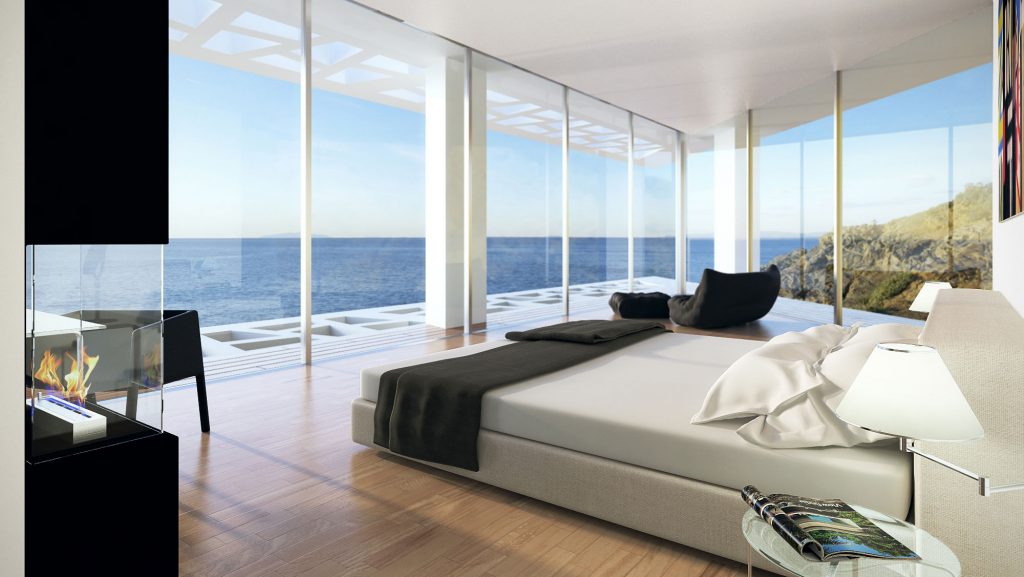 bed in a room with a panoramic view