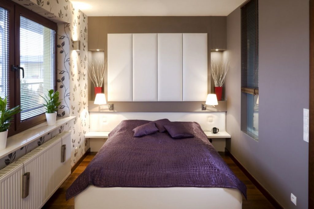 bed in a rectangular room