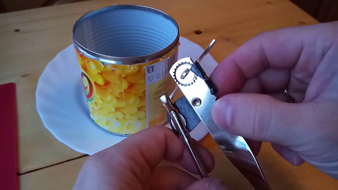 a bottle opener with a wheelbarrow.