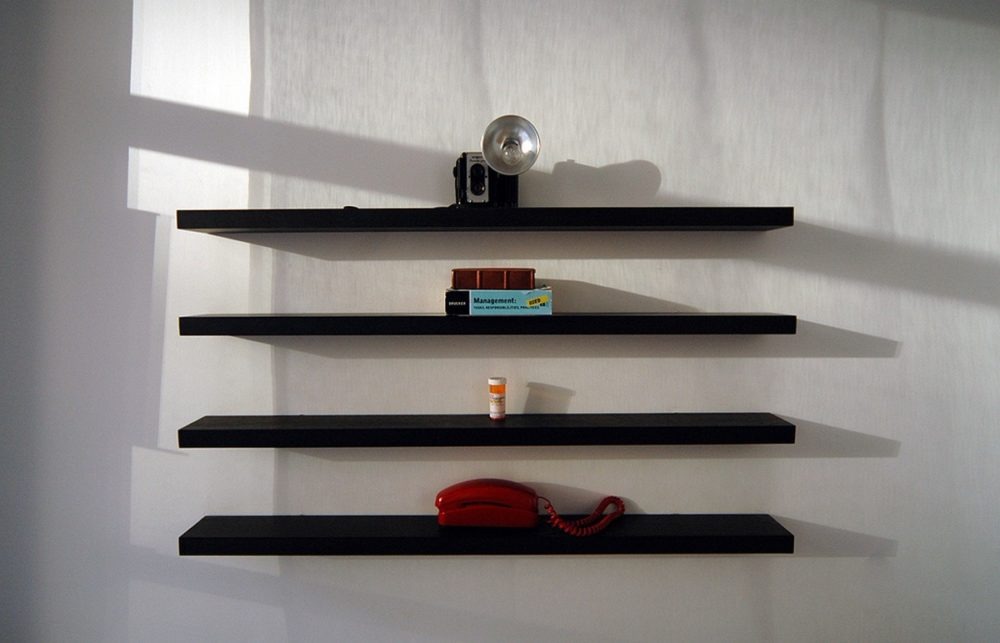 shelves on a concrete wall