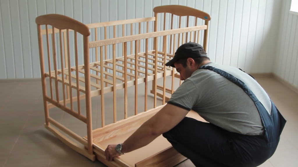 installation of elements for a crib with a pendulum