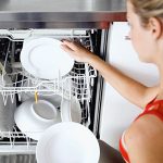 loading dishes into the dishwasher