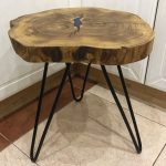 table with saw cut on high legs