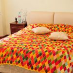 variegated knitted bedspread