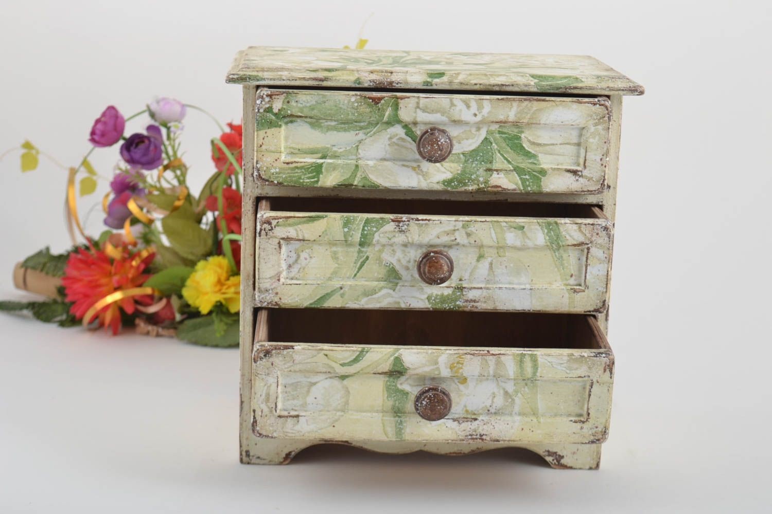 chest of drawers with green pattern