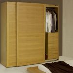 plywood wardrobe with clothes