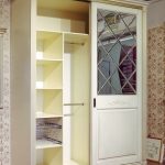 sliding wardrobe with beveled mirror interior