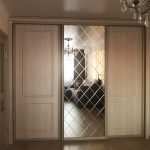 sliding wardrobe with facet mirror photo design