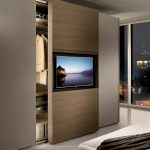 wardrobe with TV interior photo