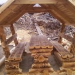 table in the gazebo and benches from the log house