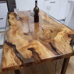 lacquered table with saw cut