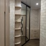 corner wardrobe in the hallway with shelves