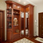 corner wardrobe in the hallway with a sheepskin coat