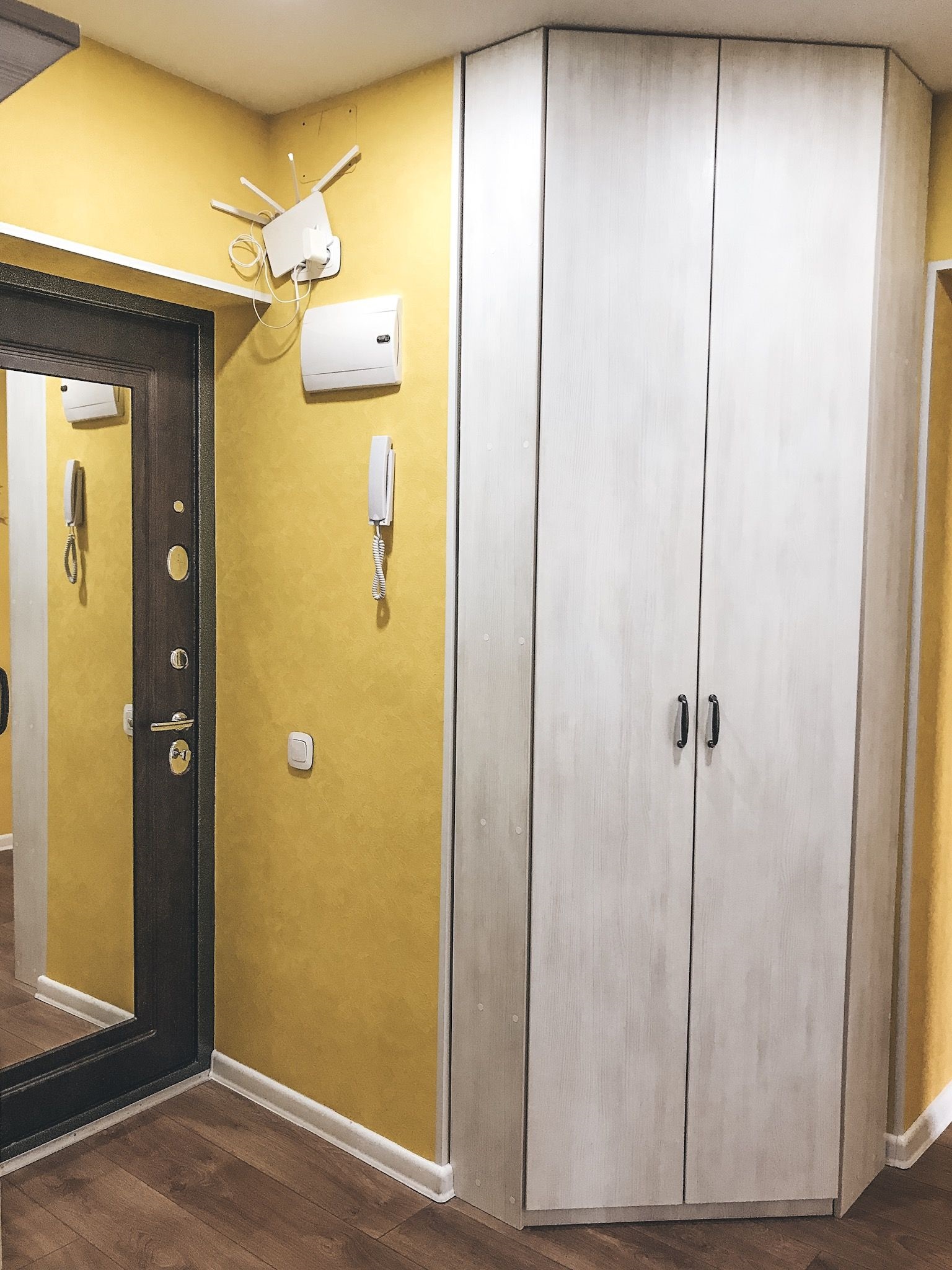 built-in corner wardrobe in the hallway