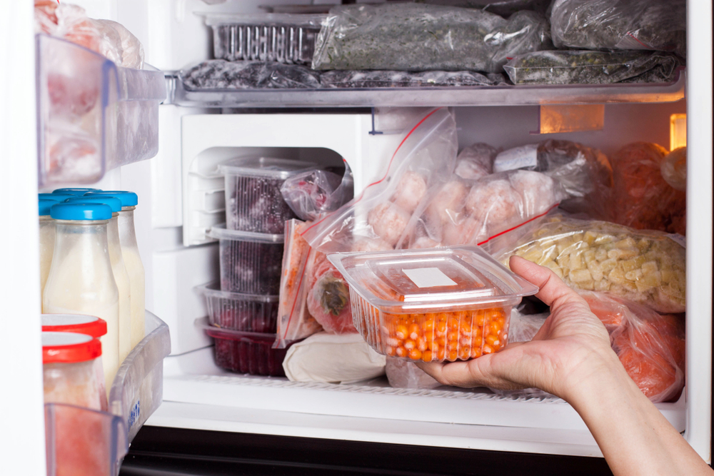 taking food out of the refrigerator