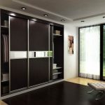 built-in wardrobe with stretch ceiling photo