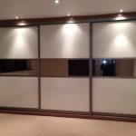 built-in wardrobe with stretch ceiling types of design