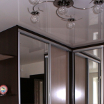 built-in wardrobe and stretch ceiling photo