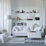 shelves with souvenirs above the sofa