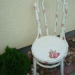 decoupage chair in the corner flower