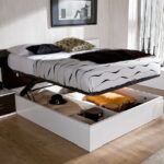 bed in the bedroom with drawer