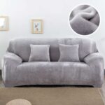 gray sofa cover with pillows