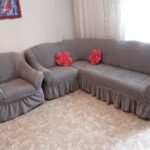 gray sofa cover with armchair