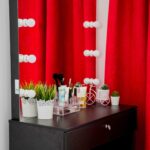 dressing table with red curtain