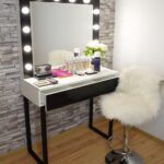 dressing table with fluffy armchair