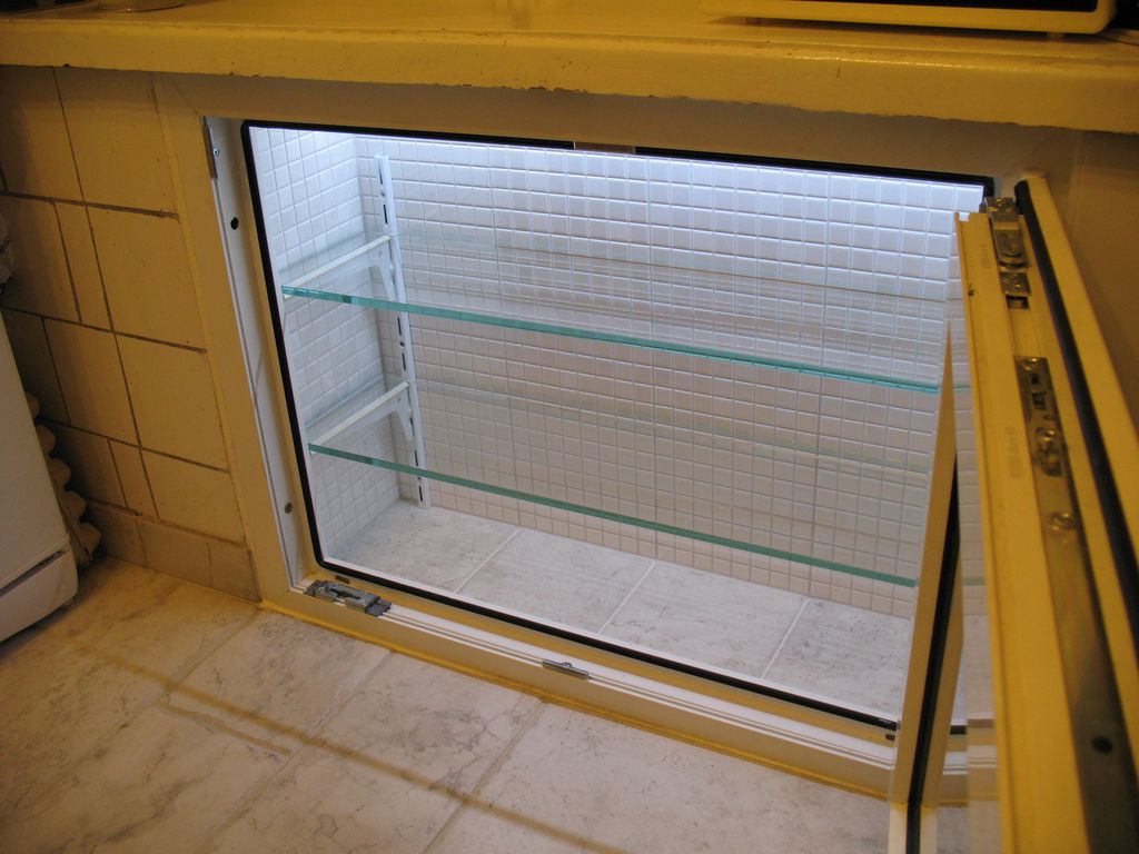 refrigerator under the window