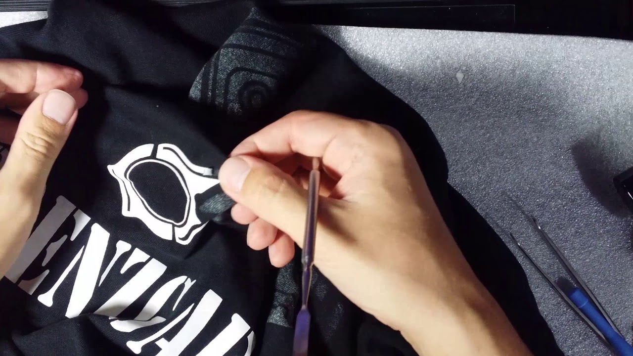 how to remove a sticker from clothes