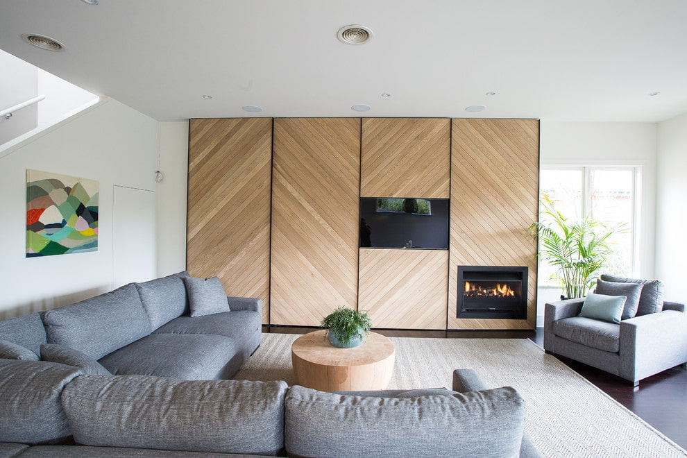 wardrobe with TV and fireplace in the living room