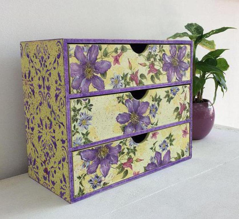 chest of drawers made of cardboard with flowers