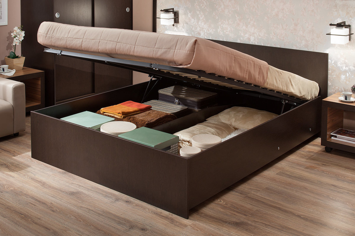 bed with a lifting mechanism in the interior