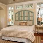 bed by the window in the bedroom design ideas