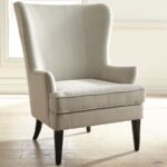 white armchair with black legs