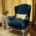 soft blue armchair with cushion