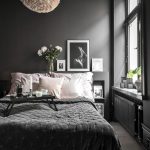 example of a dark bedroom with black walls