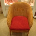 orange wicker armchair