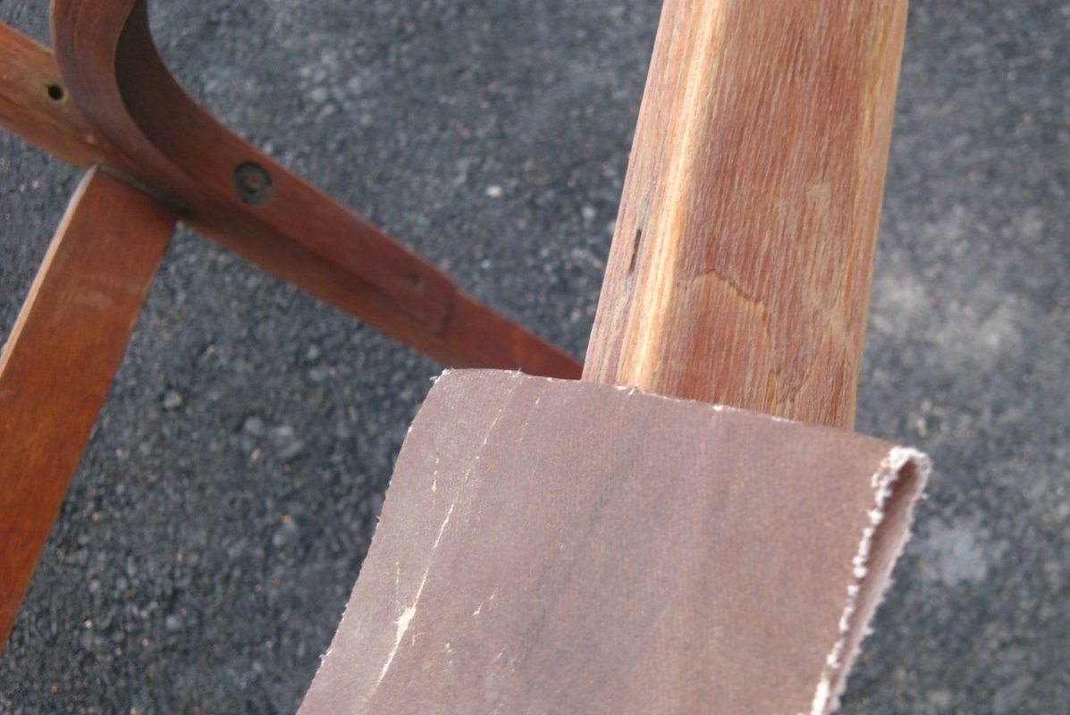 sanding the chair