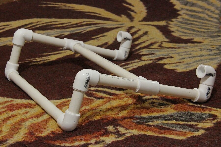 laptop stand made of plastic pipes