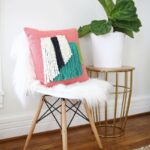 fringed chair cushion