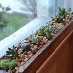 shelf for flowers on the windowsill