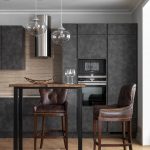 gray kitchen with brown chairs