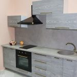 gray kitchen with hood