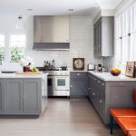 gray kitchen with orange